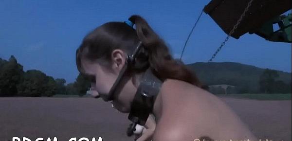  Slave has to wear a metal cage helmet  during slit torturing